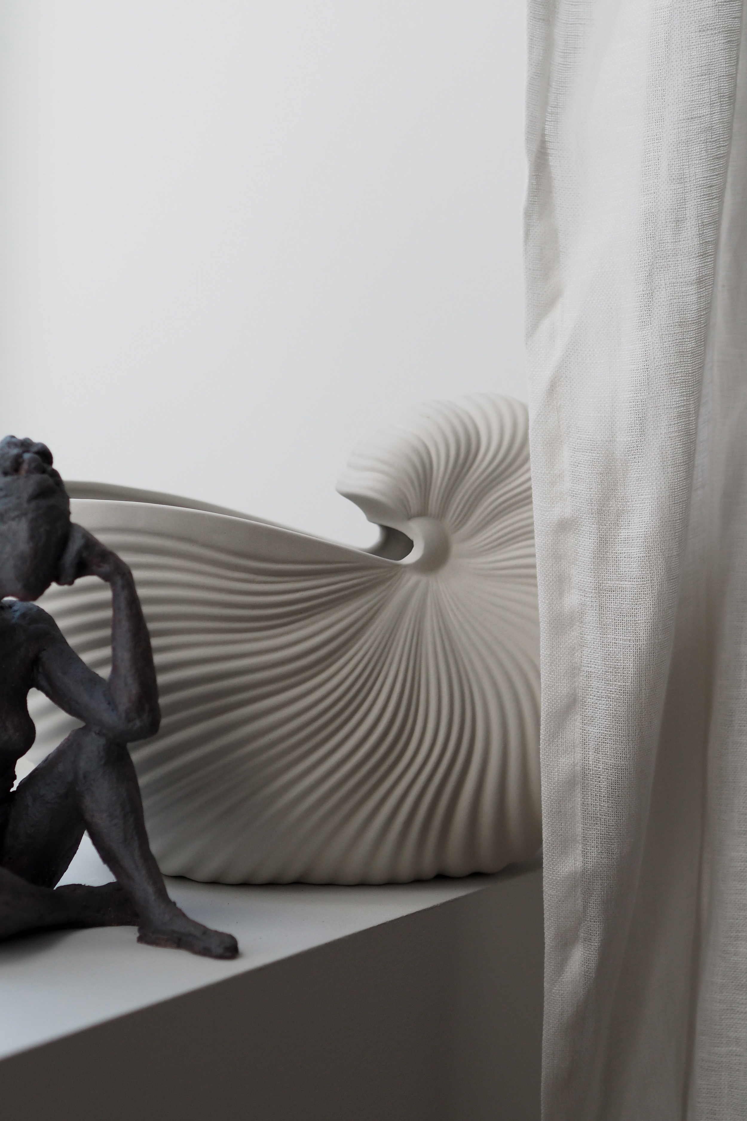 Ferm Living Shell pot - sculptural lines and shadows